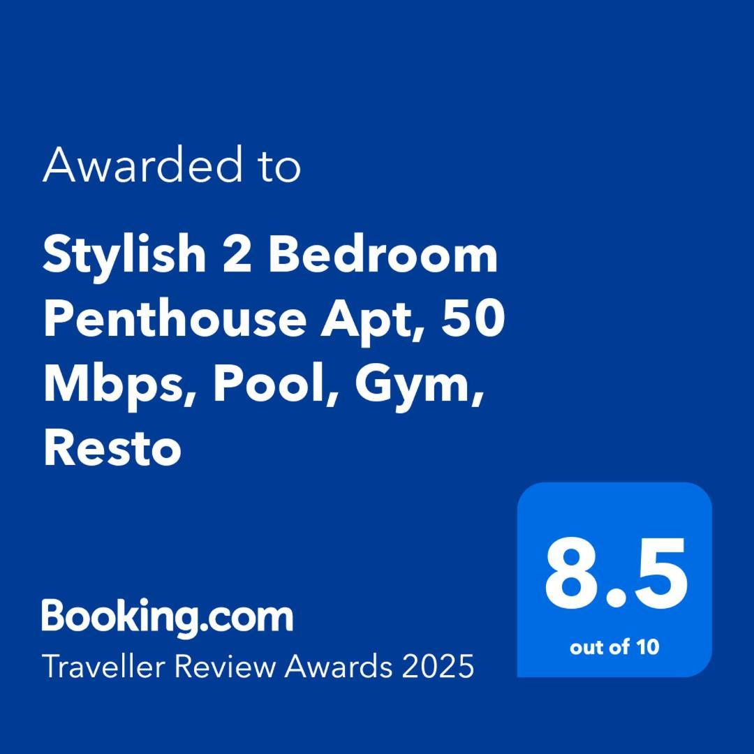 Stylish 2 Bedroom Penthouse Apt, Newly Refreshed, 50 Mbps, Pool, Gym, Resto Appartement